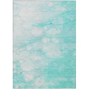 Photo of Aqua Ivory And Teal Blue Abstract Washable Indoor Outdoor Area Rug