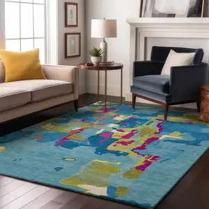 Photo of Aqua Lime Green And Pink Abstract Washable Area Rug With UV Protection