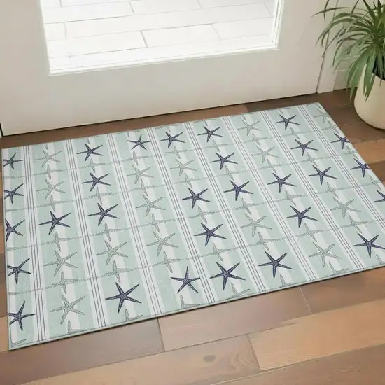 Aqua Navy Blue And Ivory Geometric Washable Area Rug With UV Protection Photo 1