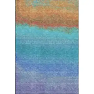 Photo of Aqua Orange And Copper Ombre Washable Area Rug With UV Protection