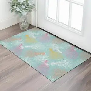 Photo of Aqua Orange And Pink Geometric Washable Area Rug With UV Protection