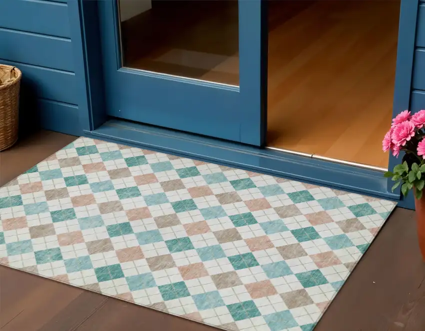 Aqua Peach And Ivory Geometric Washable Indoor Outdoor Area Rug Photo 1
