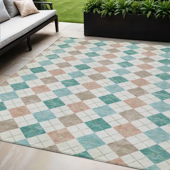 Aqua Peach And Ivory Geometric Washable Indoor Outdoor Area Rug Photo 1
