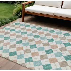 Photo of Aqua Peach And Ivory Geometric Washable Indoor Outdoor Area Rug