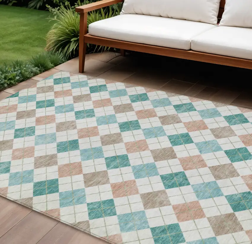 Aqua Peach And Ivory Geometric Washable Indoor Outdoor Area Rug Photo 1