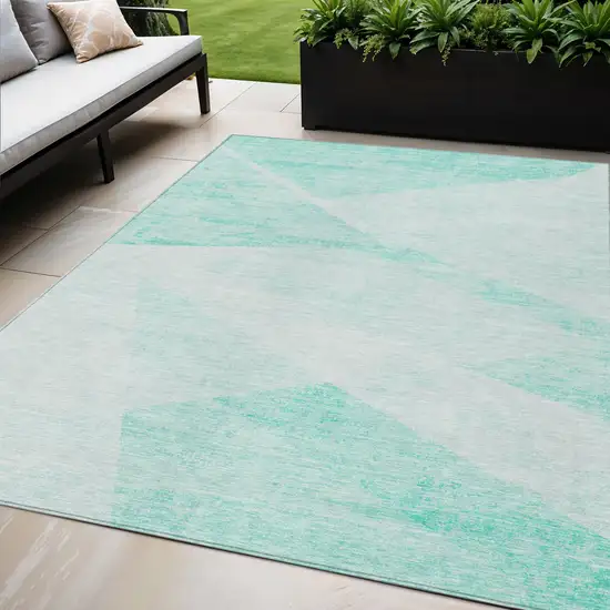 Aqua Sky Blue And Ivory Abstract Washable Indoor Outdoor Area Rug Photo 1