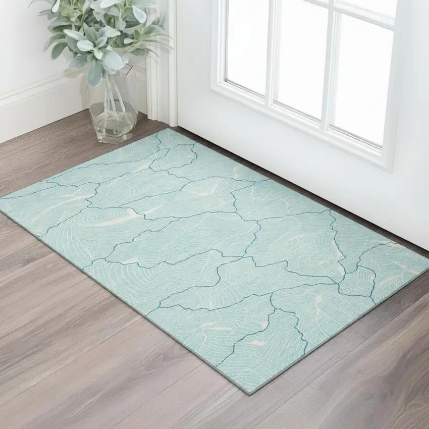 Aqua Teal And Ivory Abstract Washable Area Rug With UV Protection Photo 2