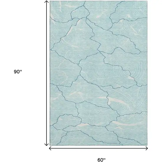Aqua Teal And Ivory Abstract Washable Area Rug With UV Protection Photo 9