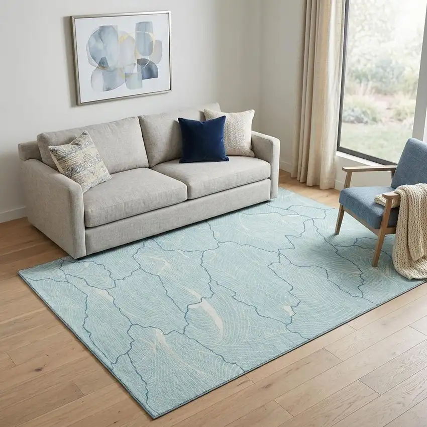 Aqua Teal And Ivory Abstract Washable Area Rug With UV Protection Photo 1