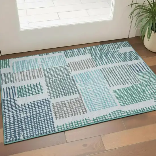 Aqua Teal And Ivory Geometric Washable Area Rug With UV Protection Photo 2