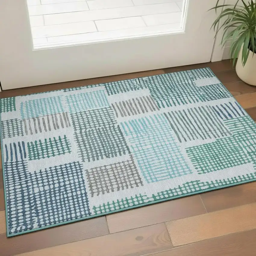 Aqua Teal And Ivory Geometric Washable Area Rug With UV Protection Photo 2