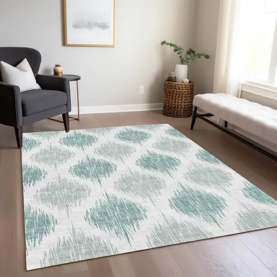 Aqua Teal Blue And Ivory Ikat Washable Indoor Outdoor Area Rug Photo 9