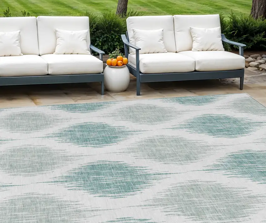 Aqua Teal Blue And Ivory Ikat Washable Indoor Outdoor Area Rug Photo 1