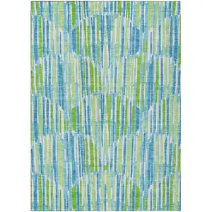 Photo of Aqua Teal Blue And Lime Green Abstract Washable Indoor Outdoor Area Rug