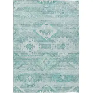 Photo of Aqua Turquoise And Ivory Southwestern Washable Indoor Outdoor Area Rug