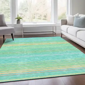 Photo of Aqua Yellow And Peach Striped Washable Area Rug With UV Protection