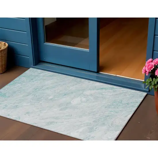 Aquamarine And Ivory Abstract Washable Indoor Outdoor Area Rug Photo 1