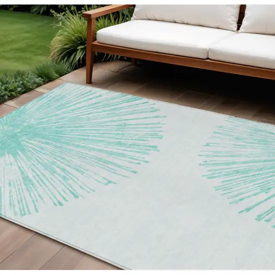 Aquamarine And Ivory Abstract Washable Indoor Outdoor Area Rug Photo 1