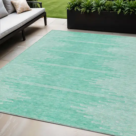 Aquamarine And Ivory Abstract Washable Indoor Outdoor Area Rug Photo 2