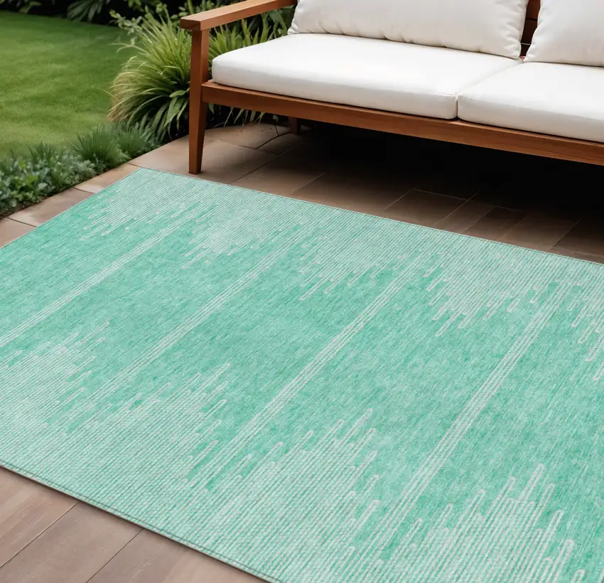 Aquamarine And Ivory Abstract Washable Indoor Outdoor Area Rug Photo 1