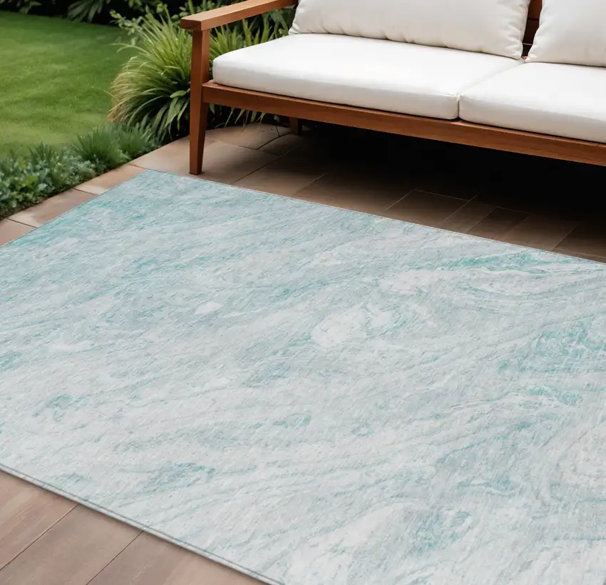 Aquamarine Aqua And Ivory Abstract Washable Indoor Outdoor Area Rug Photo 1