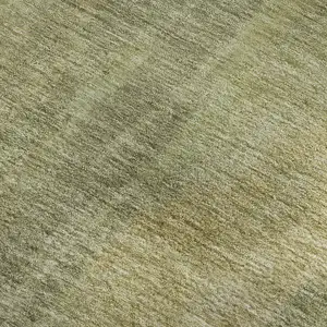 Photo of Artichoke Green And Copper Abstract Washable Area Rug With UV Protection