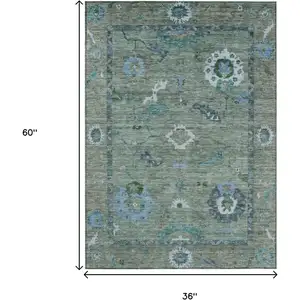 Photo of Artichoke Green And Denim Blue Floral Medallion Washable Indoor Outdoor Area Rug