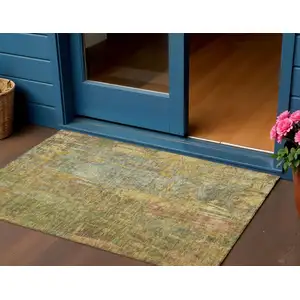 Photo of Artichoke Green And Gold Abstract Washable Indoor Outdoor Area Rug