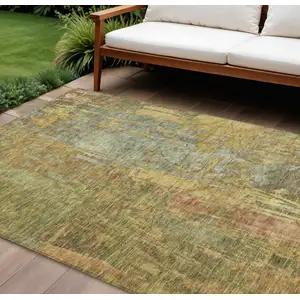 Photo of Artichoke Green And Gold Abstract Washable Indoor Outdoor Area Rug