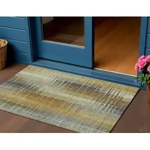 Photo of Artichoke Green And Gold Striped Washable Indoor Outdoor Area Rug