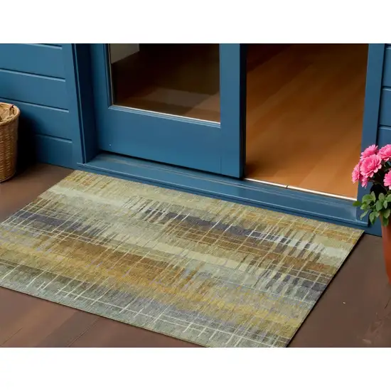 Artichoke Green And Gold Striped Washable Indoor Outdoor Area Rug Photo 1