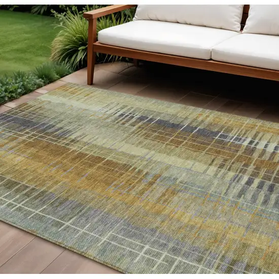 Artichoke Green And Gold Striped Washable Indoor Outdoor Area Rug Photo 1