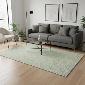 Photo of Artichoke Green And Ivory Abstract Geometric Washable Area Rug With UV Protection