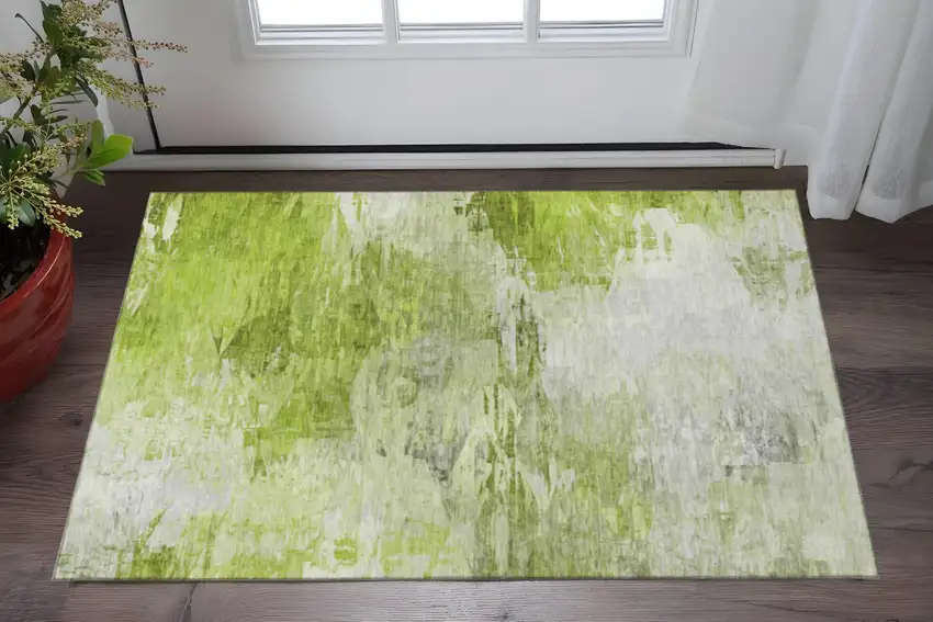 Artichoke Green And Ivory Abstract Washable Area Rug With UV Protection Photo 1