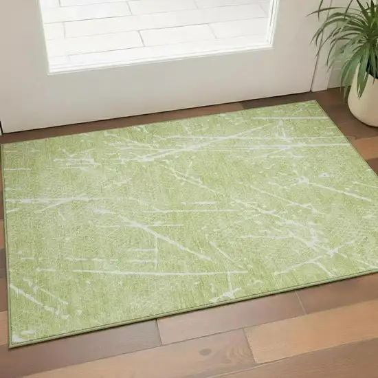 Artichoke Green And Ivory Abstract Washable Area Rug With UV Protection Photo 1