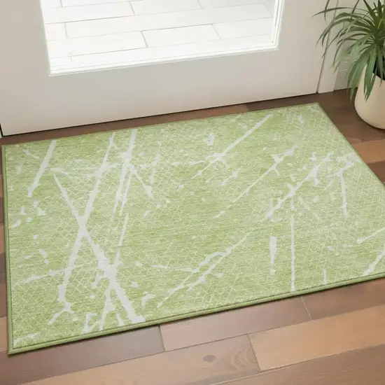 Artichoke Green And Ivory Abstract Washable Area Rug With UV Protection Photo 2