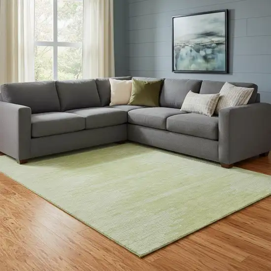 Artichoke Green And Ivory Abstract Washable Area Rug With UV Protection Photo 1