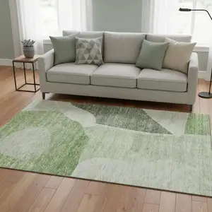 Photo of Artichoke Green And Ivory Abstract Washable Area Rug With UV Protection