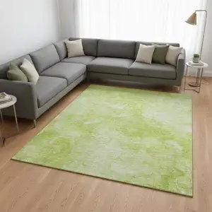 Photo of Artichoke Green And Ivory Abstract Washable Area Rug With UV Protection