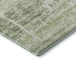 Photo of Artichoke Green And Ivory Abstract Washable Area Rug With UV Protection