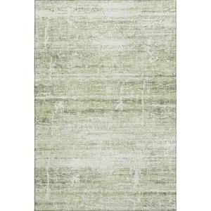 Photo of Artichoke Green And Ivory Abstract Washable Area Rug With UV Protection