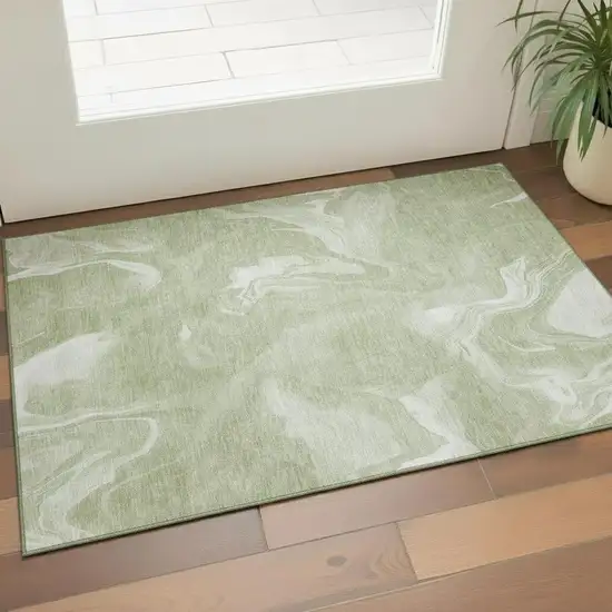 Artichoke Green And Ivory Abstract Washable Area Rug With UV Protection Photo 1