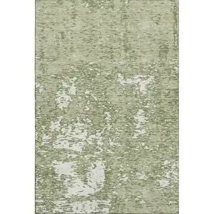 Photo of Artichoke Green And Ivory Abstract Washable Area Rug With UV Protection