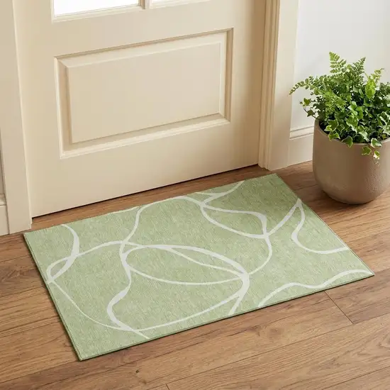Artichoke Green And Ivory Abstract Washable Area Rug With UV Protection Photo 1
