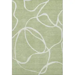 Photo of Artichoke Green And Ivory Abstract Washable Area Rug With UV Protection