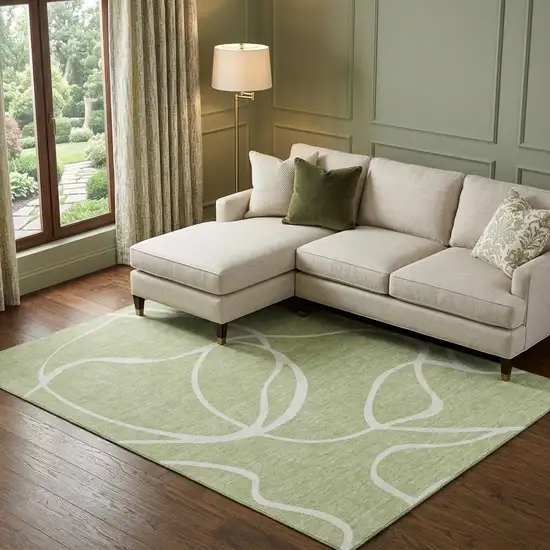 Artichoke Green And Ivory Abstract Washable Area Rug With UV Protection Photo 1