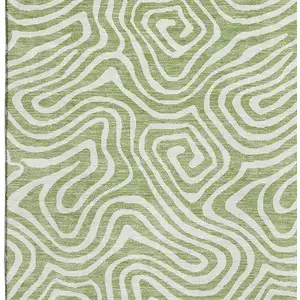 Photo of Artichoke Green And Ivory Abstract Washable Area Rug With UV Protection
