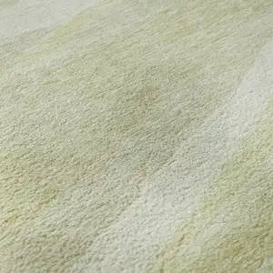 Photo of Artichoke Green And Ivory Abstract Washable Area Rug With UV Protection