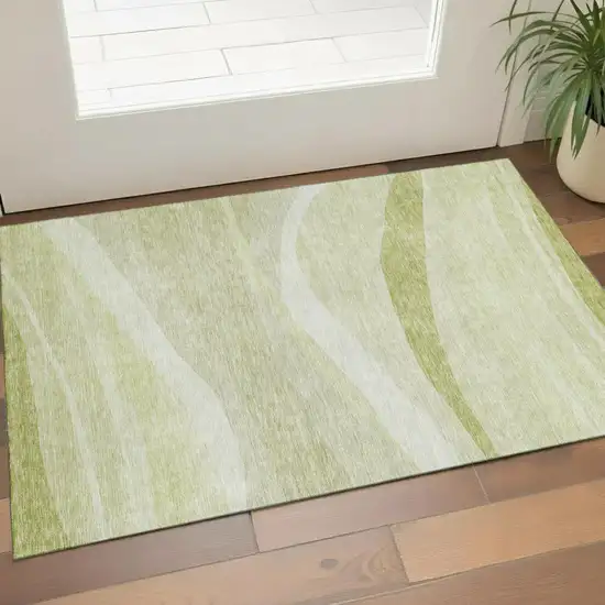 Artichoke Green And Ivory Abstract Washable Area Rug With UV Protection Photo 1