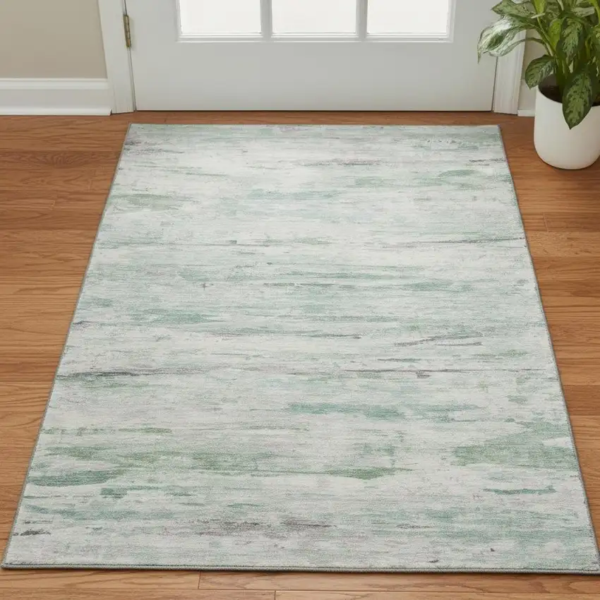 Artichoke Green And Ivory Abstract Washable Area Rug With UV Protection Photo 2
